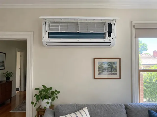 Open split system indoor unit with clean filters on a living room wall in Cumberland Park